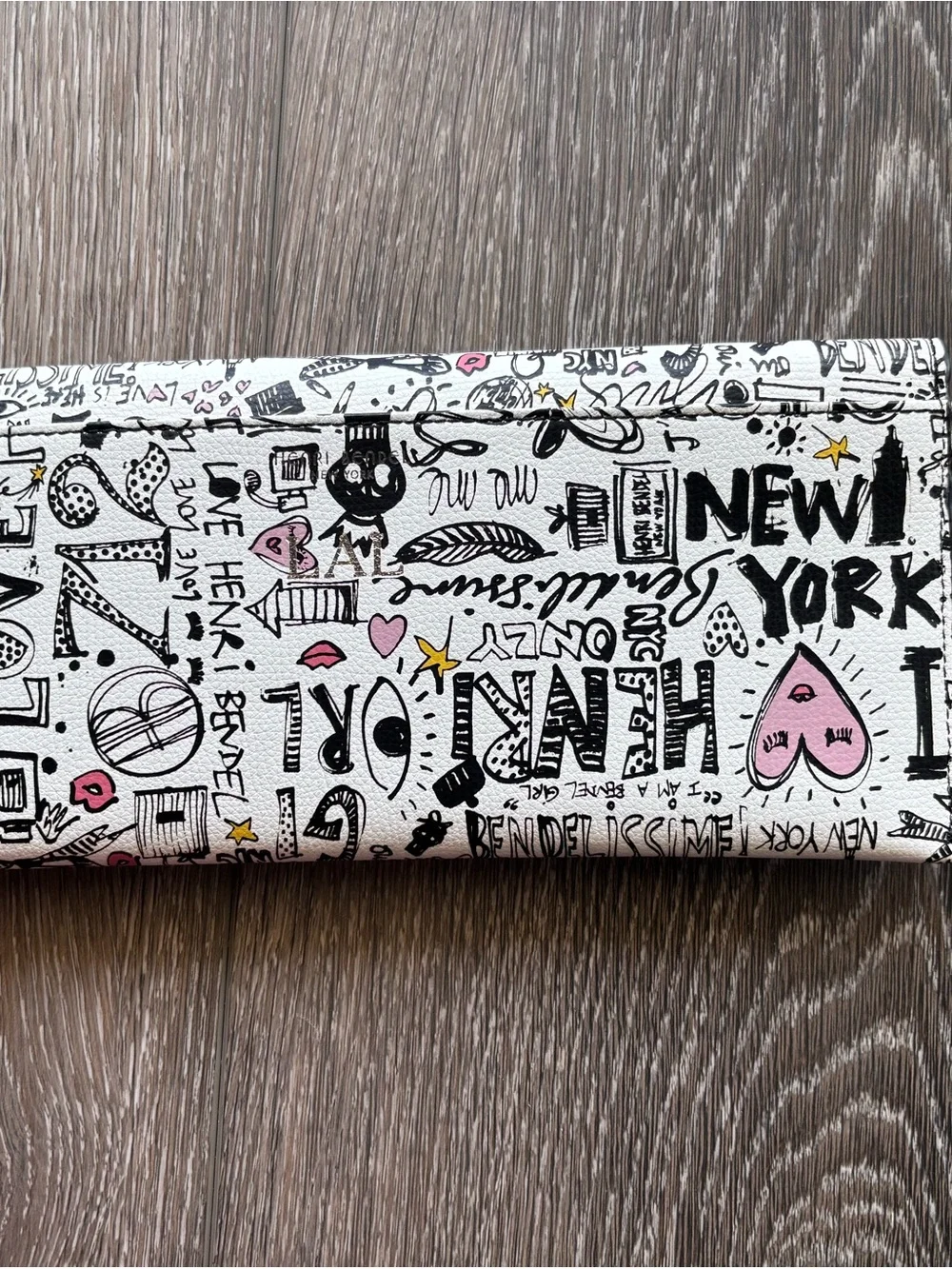 Henri Bendel White Graphic wristlet with Black and Pink Accents